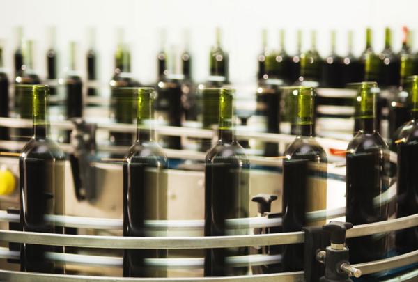 Wine bottles on a production line.